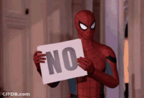 A Spiderman Holding A Sign That Says No GIF