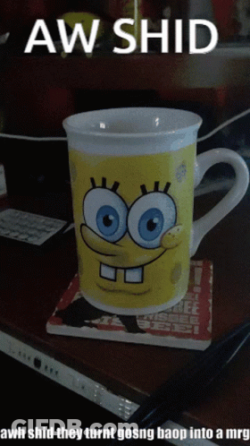A Spongebob Mug Sits On A Coaster On A Table GIF