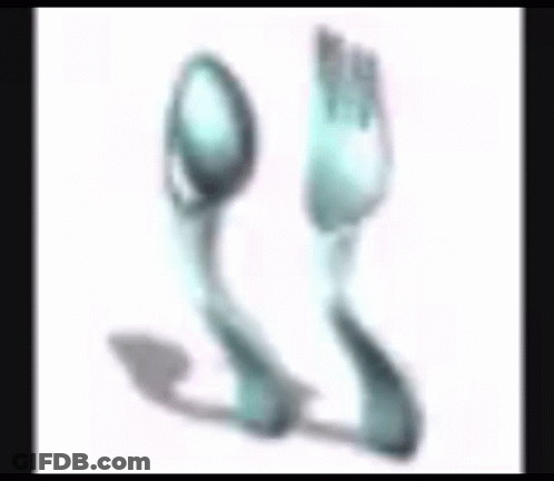 A Spoon And A Fork With A Foot In The Background GIF
