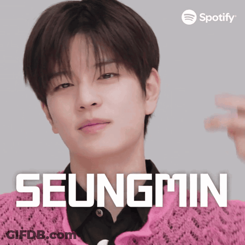 A Spotify Ad For Seungmin Shows A Man Wearing A Pink Sweater GIF