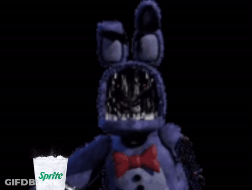 A Sprite Glass With Ice In Front Of A Purple Stuffed Animal GIF