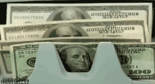 A Stack Of 100 Dollar Bills Being Counted GIF