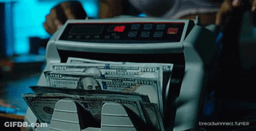 A Stack Of 100 Dollar Bills Being Counted By A Machine GIF