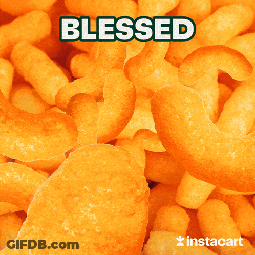 A Stack Of Chocolate Chip Cookies With The Word Blessed On Top GIF
