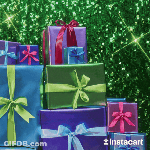 A Stack Of Colorful Presents With Instacart Written On The Bottom GIF