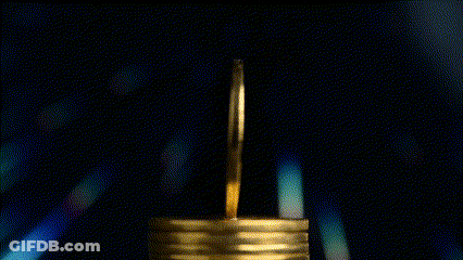 A Stack Of Gold Coins With The Letter B On Them GIF