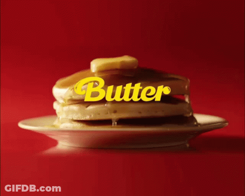 A Stack Of Pancakes On A Plate With The Word Butter Written On It GIF