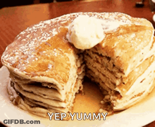 A Stack Of Pancakes With A Slice Taken Out Of One Of Them And The Words Yep Yummy Below It GIF