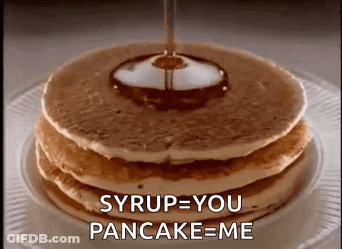 A Stack Of Pancakes With Syrup Being Poured On Top GIF