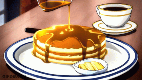 A Stack Of Pancakes With Syrup Being Poured On Top GIF