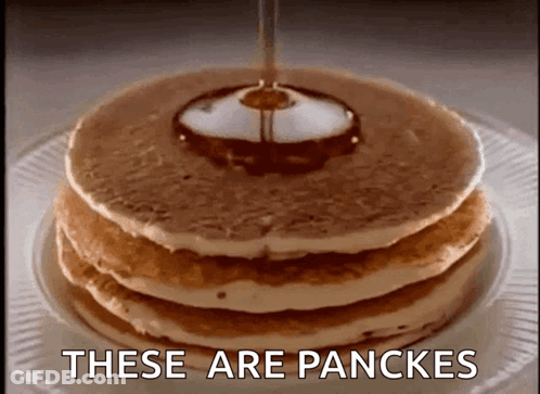 A Stack Of Pancakes With Syrup Being Poured On Top With The Words These Are Pancakes Written Below Them GIF
