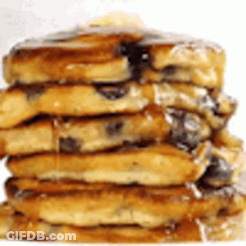 A Stack Of Pancakes With Syrup On Top Of Them On A White Background . GIF