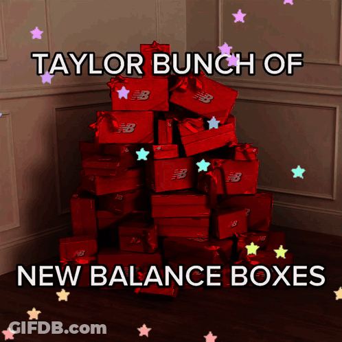 A Stack Of Red Boxes With New Balance On Them GIF