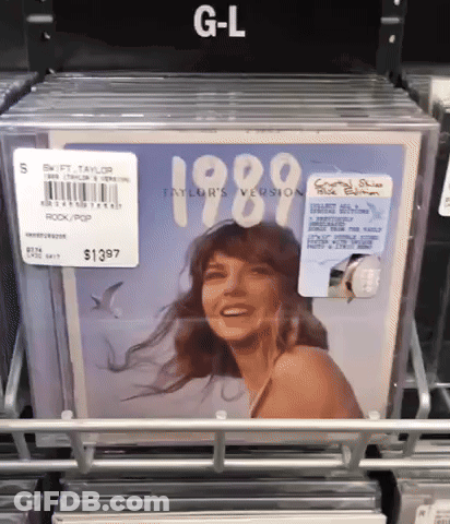 Stack Of Taylor Swift 1989 Albums GIF