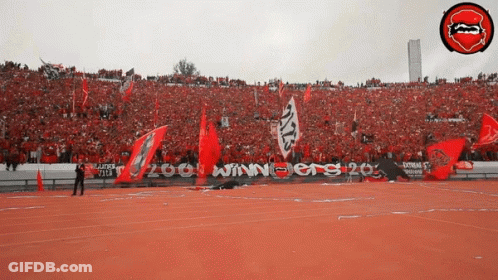 A Stadium Full Of People With A Banner That Says Winners 20 GIF