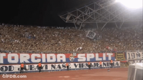 A Stadium With A Banner That Says " Corcida Split " GIF