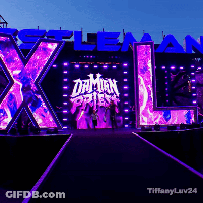 A Stage With A Large X And L And The Word Daman On It GIF