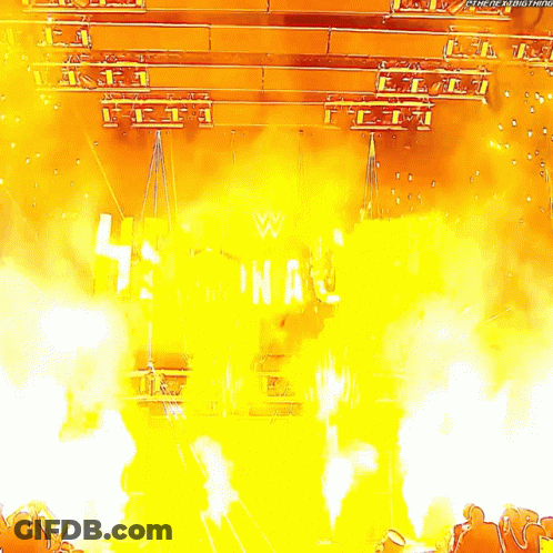 A Stage With A Sign That Says Wwe On It GIF