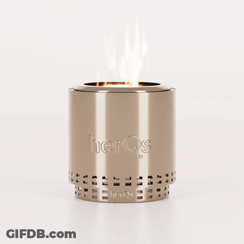 A Stainless Steel Candle Holder With The Word Herqs On It GIF