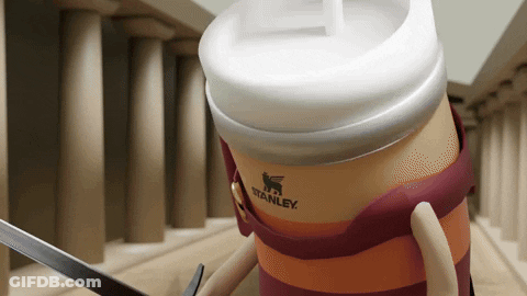 A Stanley Cup Is Holding A Sword In Front Of A Row Of Columns GIF