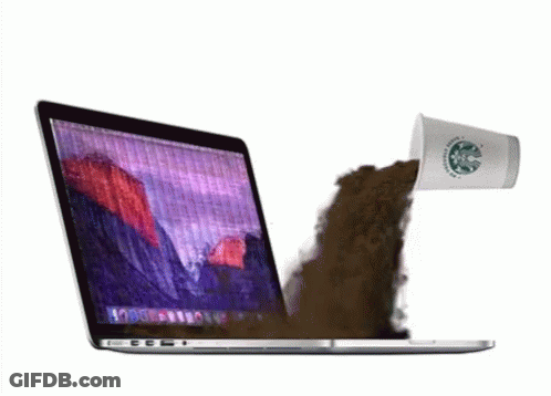 A Starbucks Cup Is Poured Into A Laptop GIF