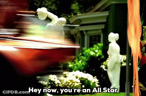 A Statue In Front Of A House With The Words Hey Now You 'Re An All Star Above It GIF