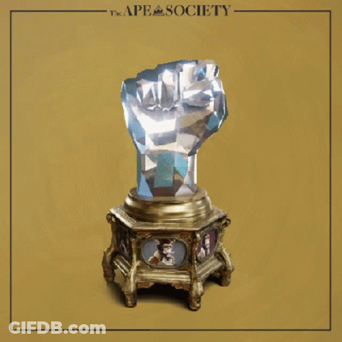A Statue Of A Fist With The Ape Society Logo On The Bottom GIF