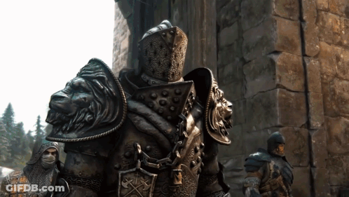 A Statue Of A Knight With A Lion Head On His Armor GIF
