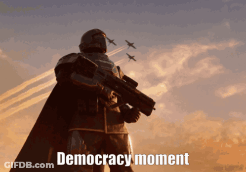 A Statue Of A Man Holding A Gun With The Words " Democracy Moment " Above Him GIF