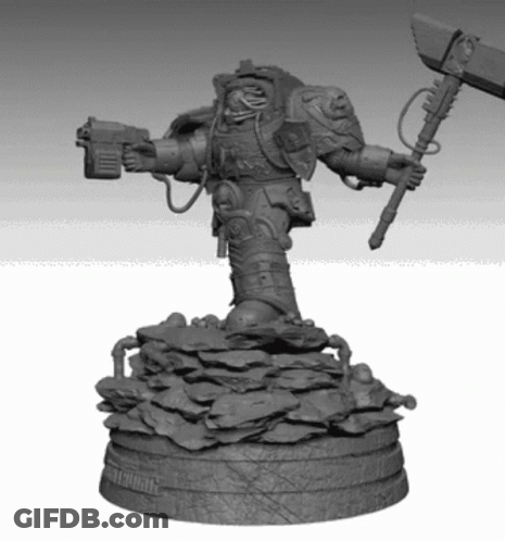 A Statue Of A Man Holding A Hammer And A Gun Is On A Rocky Base GIF