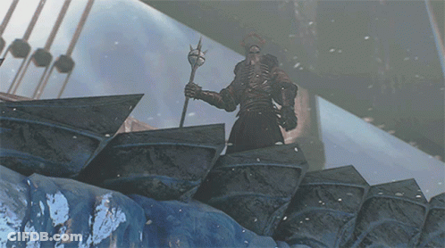 A Statue Of A Man Holding A Trident In A Snowy Area GIF