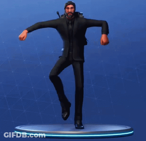 A Statue Of A Man In A Suit And Tie Is Dancing GIF