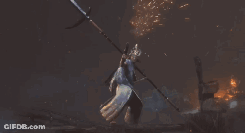 A Statue Of A Man Is Surrounded By Flames GIF