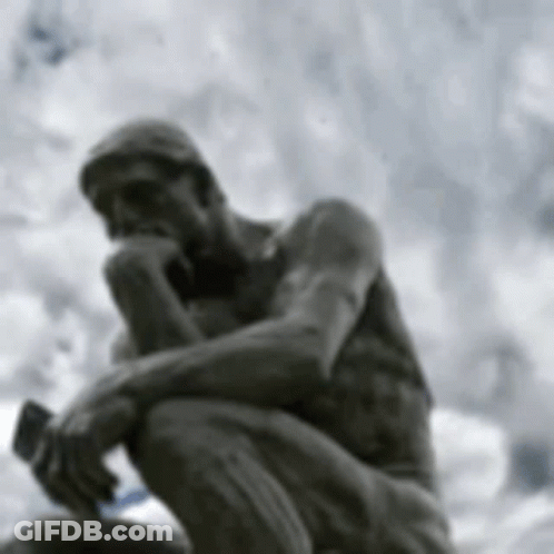 A Statue Of A Man Kneeling Down With His Hand On His Chin . GIF