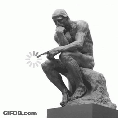 A Statue Of A Man Sitting On A Rock Pointing At A Loading Circle GIF