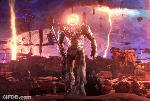 Statue Of Man With Glowing Head In Purple Sky GIF