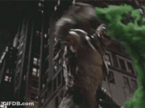 A Statue Of A Man With A Green Smoke Coming Out Of His Mouth . GIF