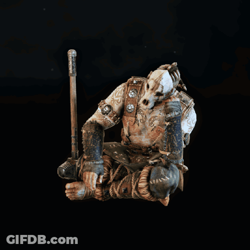 A Statue Of A Man With A Hammer And A Sword GIF