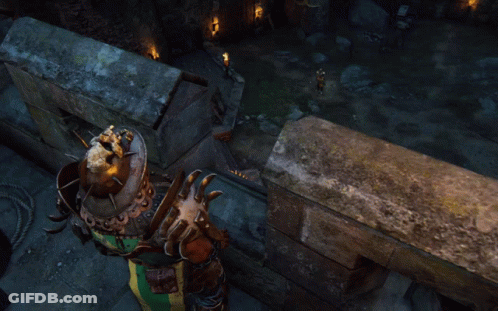 A Statue Of A Man With A Helmet And A Shield GIF