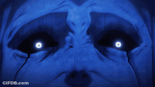 A Statue Of A Man With Glowing Eyes GIF