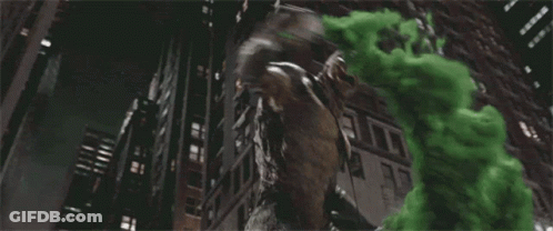 A Statue Of A Monster Is Surrounded By Green Smoke Coming Out Of It 'S Mouth . GIF