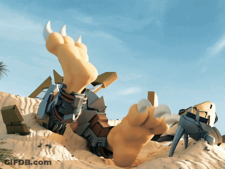 A Statue Of A Monster Laying In The Sand GIF