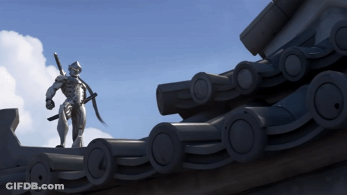 A Statue Of A Robot Holding A Sword Stands On Top Of A Roof GIF