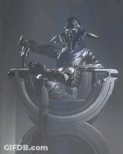 A Statue Of A Robot Sitting On A Throne GIF