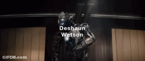 A Statue Of A Robot With The Name Deshawn Watson On It GIF