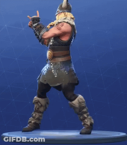 A Statue Of A Viking Wearing A Horned Helmet And A Beard Is Standing On A Pedestal . GIF