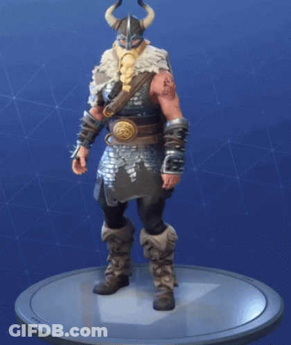 A Statue Of A Viking With Horns And A Beard Is Standing On A Platform . GIF