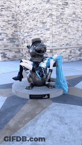 A Statue Of A Woman Laying On Top Of A Rockingham Va Statue GIF