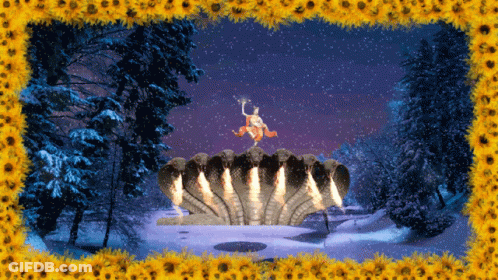 A Statue Of A Woman Standing On Top Of A Snake Surrounded By Snow And Sunflowers GIF