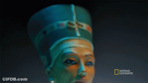 A Statue Of A Woman With A National Geographic Logo In The Corner GIF